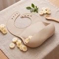 BOCIOLAND Śliniak silikonowy- Beż - opinie